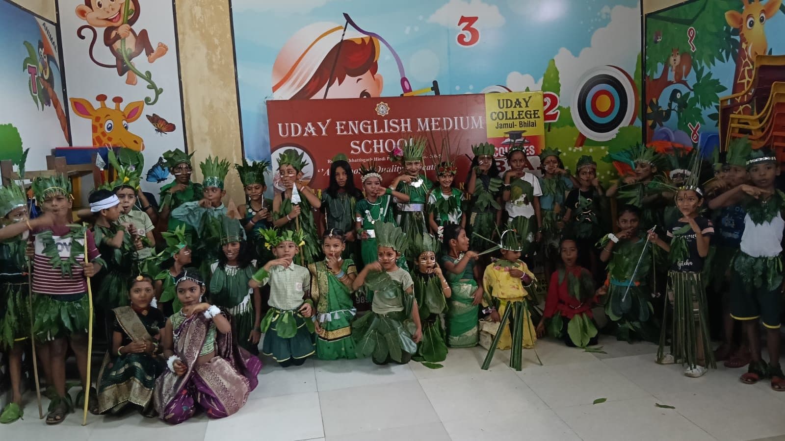 Children in handmade leaf and traditional costumes at a fancy dress competition